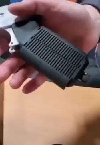 Подстраиваемая под хват ручка
