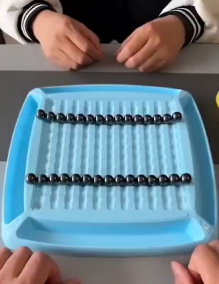 Увлекательная игра для двоих, с магнитными шариками